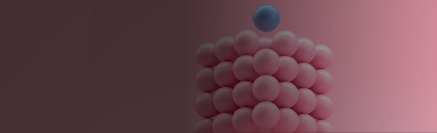Cube made of tiny pink spheres and one blue sphere.